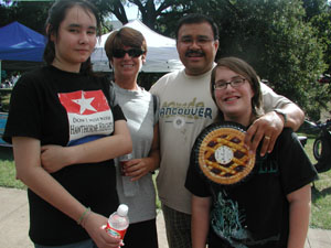 customers holding "pie-casso"